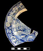 Pearlware small plate underglaze printed in medium blue. Continuous repeating floral border. 6.25” rim diameter, 0.5” vessel height.